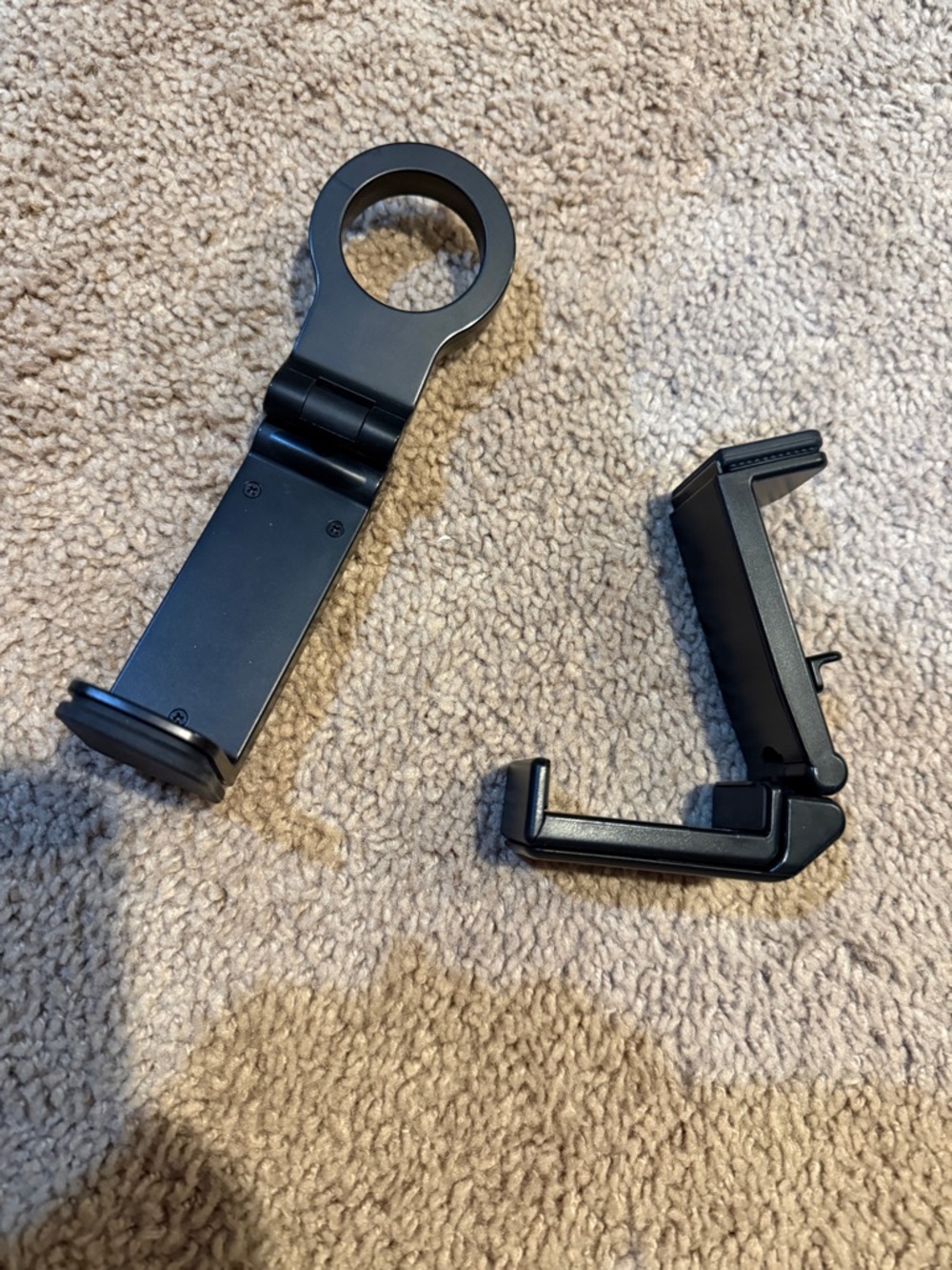 Pair of black clamp phone holders